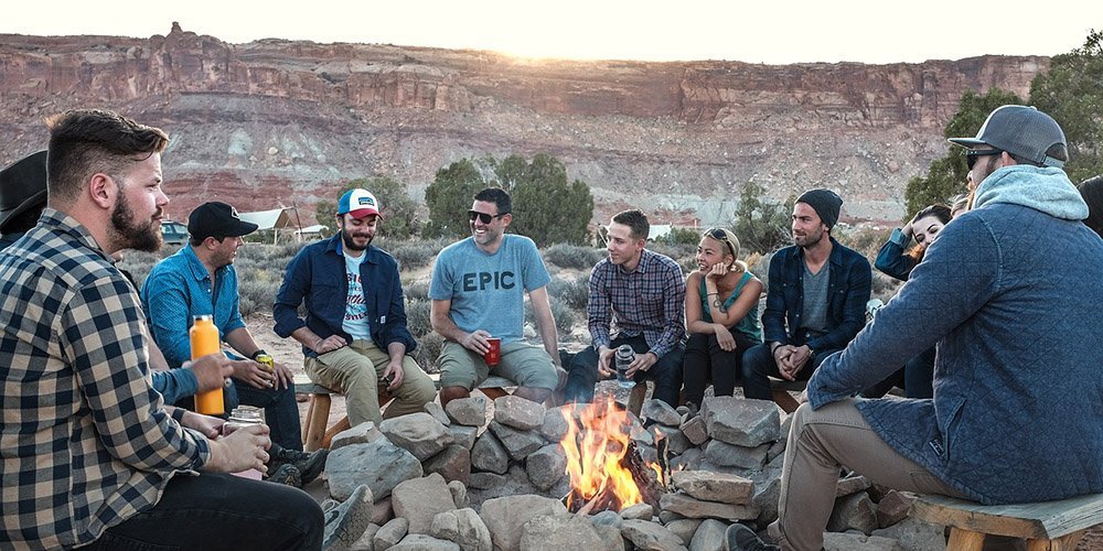 Friends having fun around the campfire