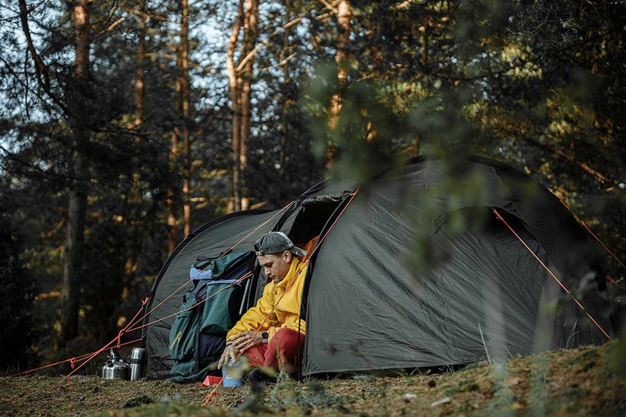 Person in his tent