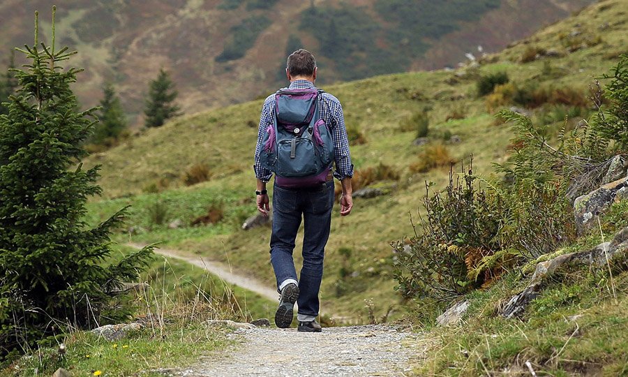 hiking in jeans in the mountains